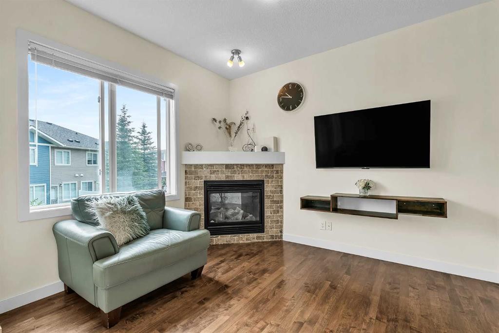 43 Sage Hill Common Nw, Calgary, AB - Indoor Photo Showing Living Room With Fireplace