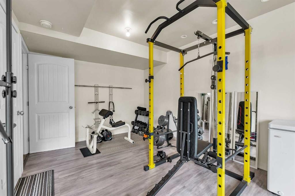 43 Sage Hill Common Nw, Calgary, AB - Indoor Photo Showing Gym Room