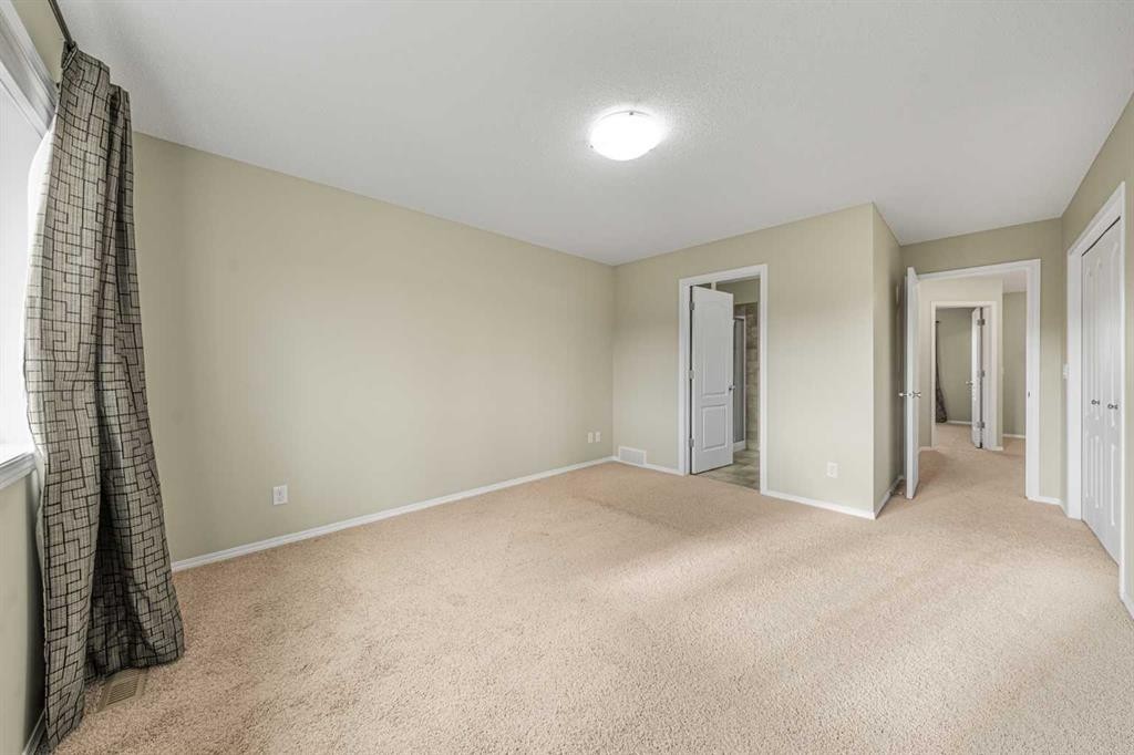 48 Panatella Common Nw, Calgary, AB - Indoor Photo Showing Other Room