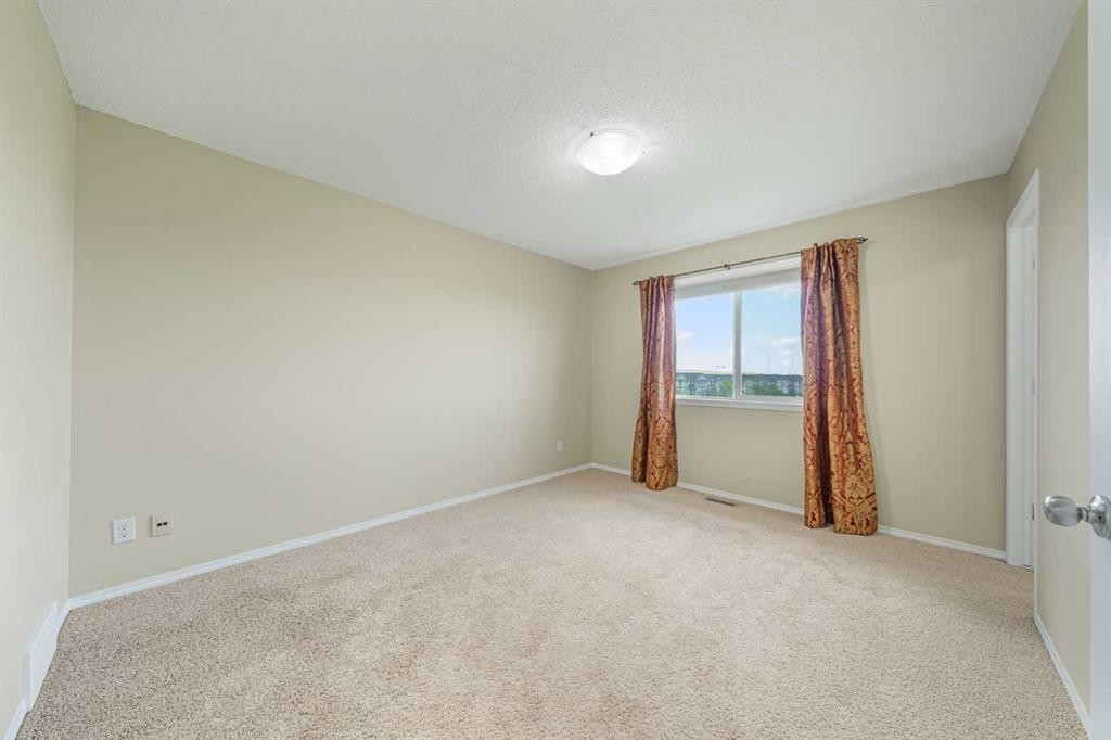 48 Panatella Common Nw, Calgary, AB - Indoor Photo Showing Other Room