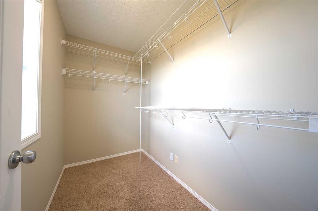 48 Panatella Common Nw, Calgary, AB - Indoor With Storage