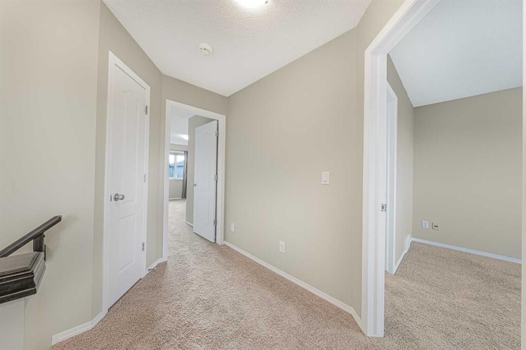 48 Panatella Common Nw, Calgary, AB - Indoor Photo Showing Other Room