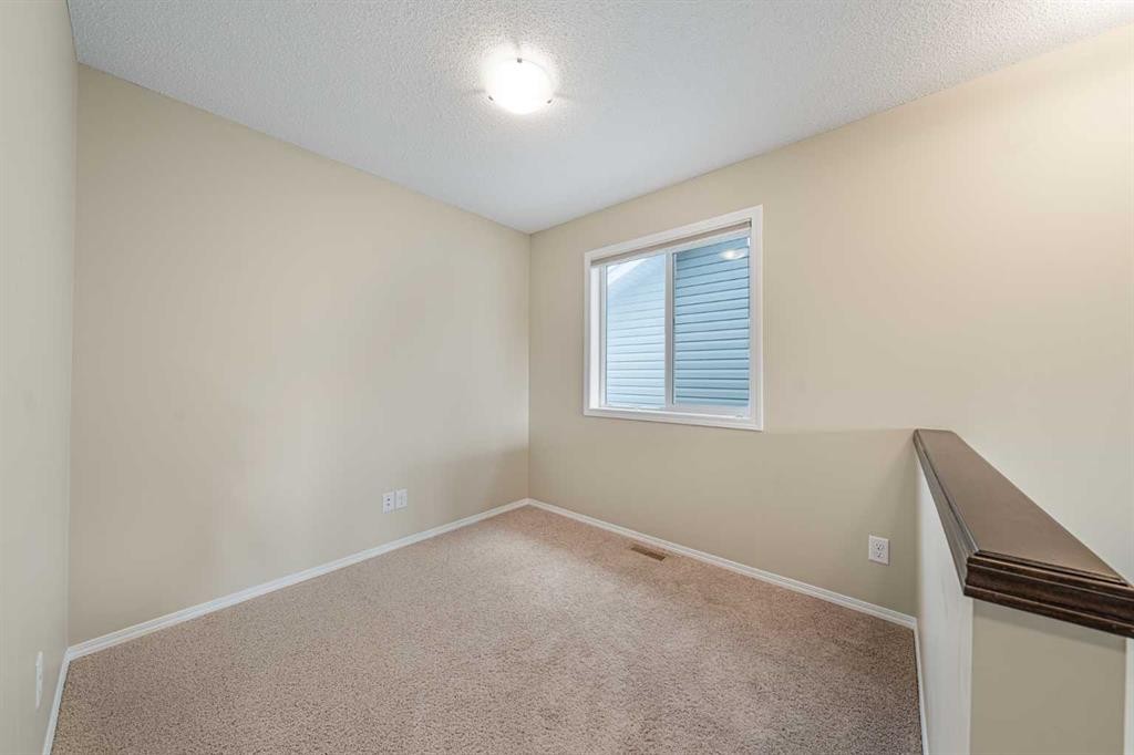 48 Panatella Common Nw, Calgary, AB - Indoor Photo Showing Other Room