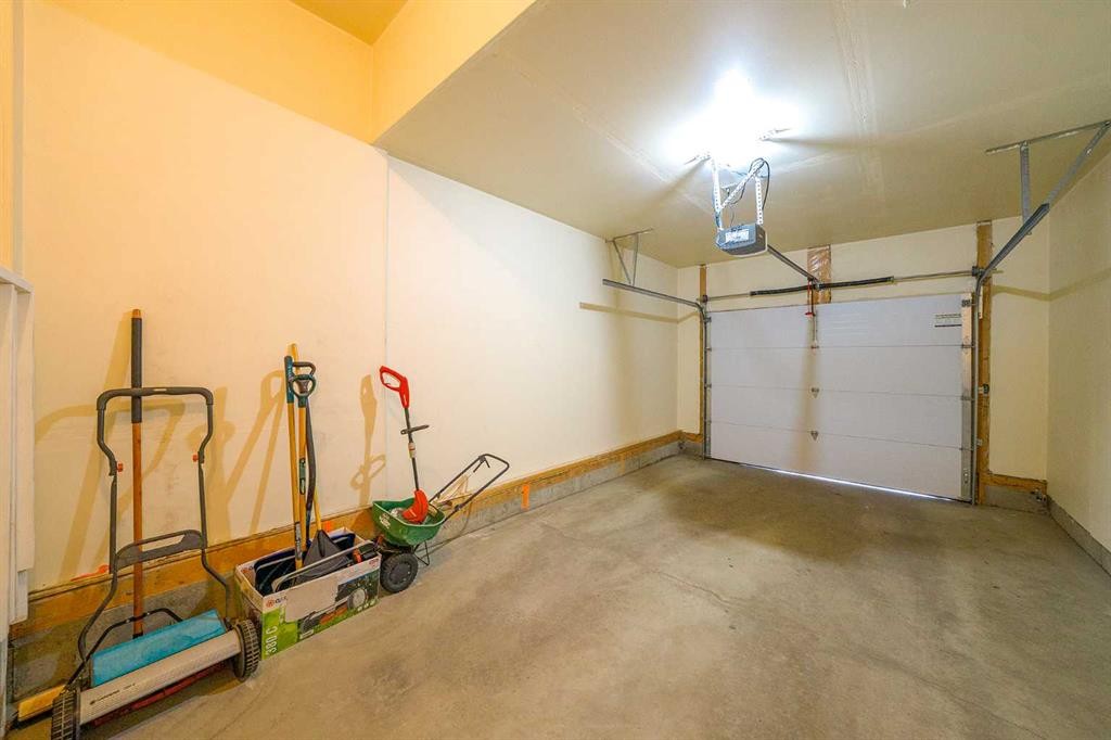 48 Panatella Common Nw, Calgary, AB - Indoor Photo Showing Garage