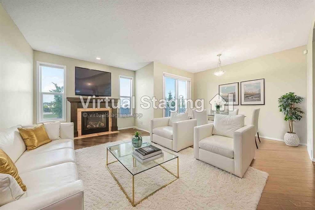 48 Panatella Common Nw, Calgary, AB - Indoor Photo Showing Living Room With Fireplace