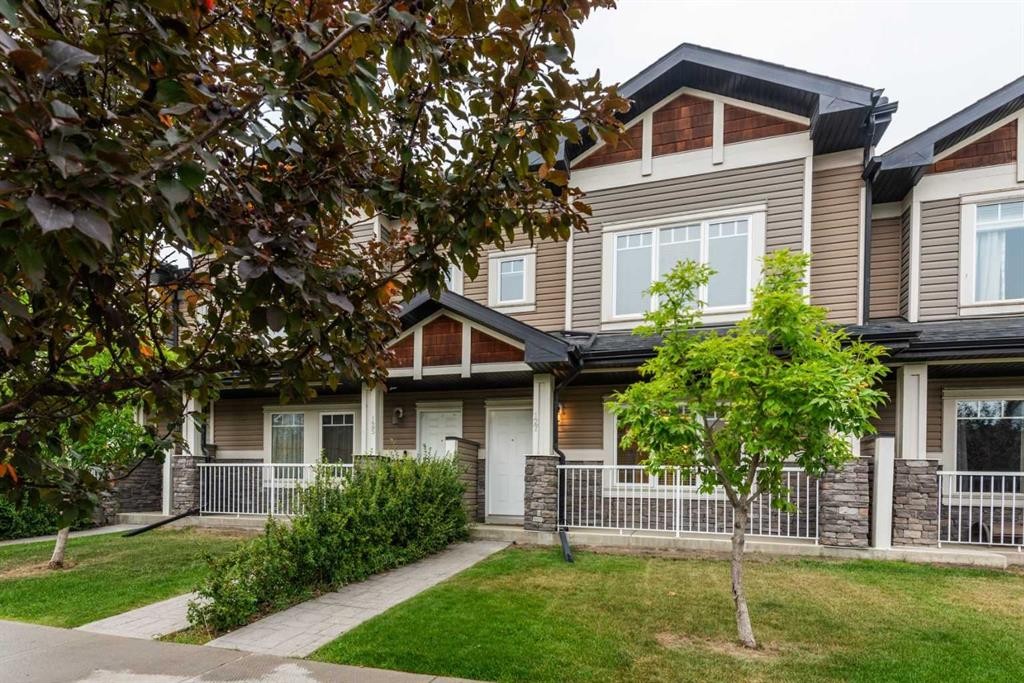 127 Prestwick Villas Se, Calgary, AB - Outdoor With Deck Patio Veranda With Facade