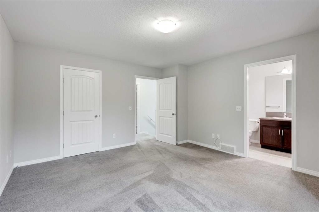 127 Prestwick Villas Se, Calgary, AB - Indoor Photo Showing Other Room