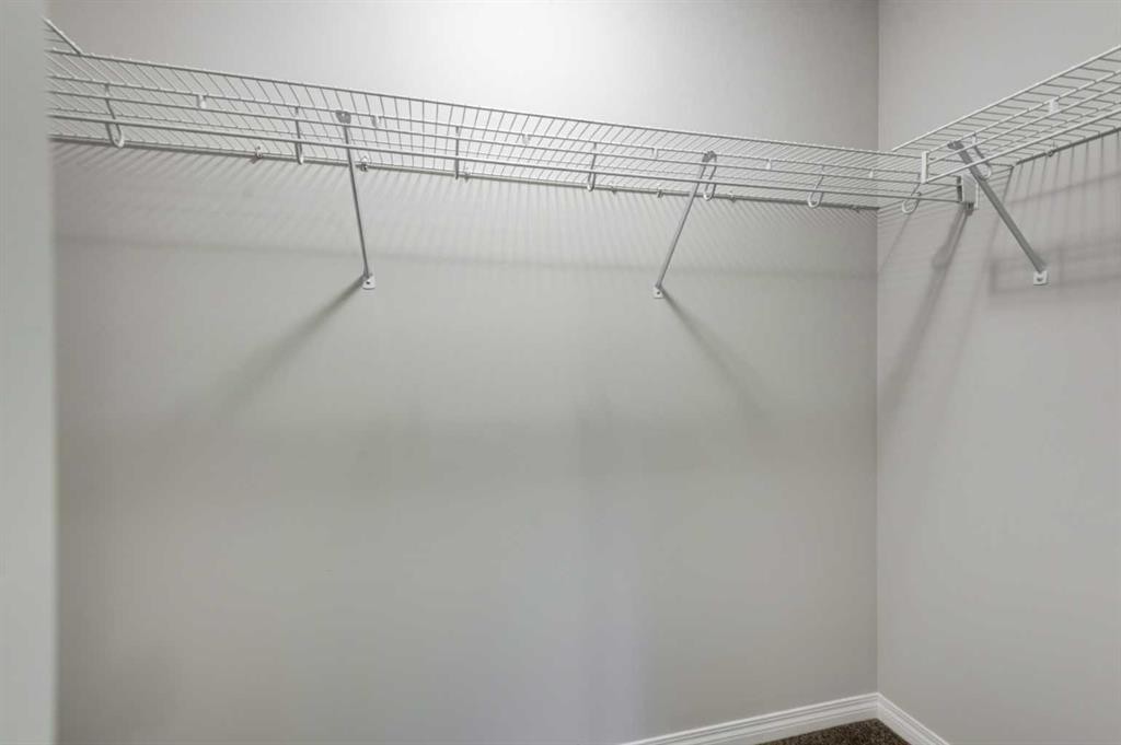 127 Prestwick Villas Se, Calgary, AB - Indoor With Storage
