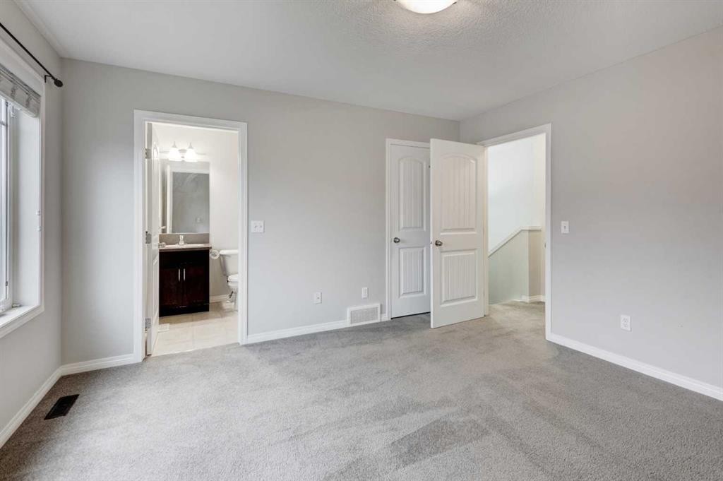 127 Prestwick Villas Se, Calgary, AB - Indoor Photo Showing Other Room