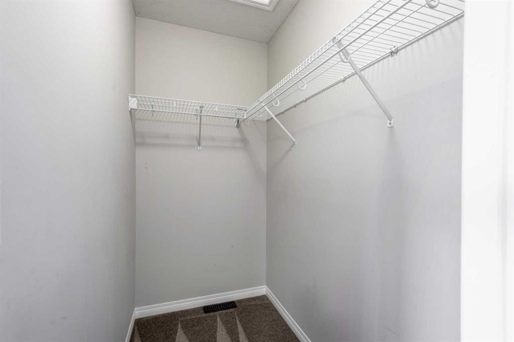 127 Prestwick Villas Se, Calgary, AB - Indoor With Storage