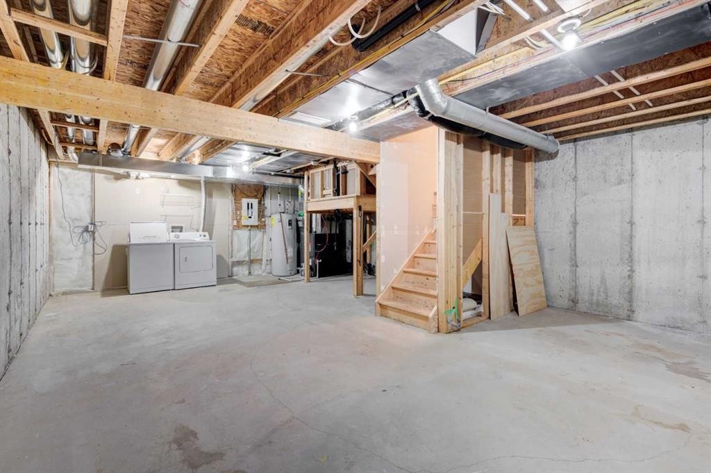 127 Prestwick Villas Se, Calgary, AB - Indoor Photo Showing Basement