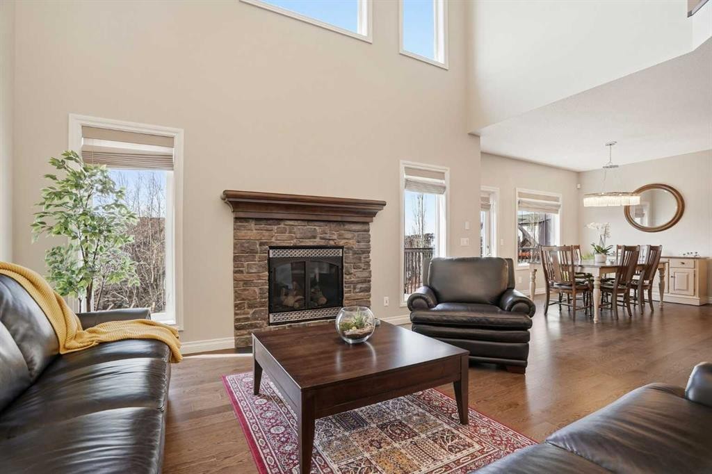 133 Aspen Stone Road Sw, Calgary, AB - Indoor Photo Showing Living Room With Fireplace