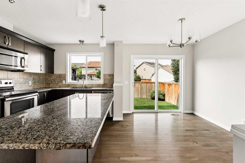 59 Elgin Meadows Park Se, Calgary, AB - Indoor Photo Showing Kitchen With Stainless Steel Kitchen With Double Sink With Upgraded Kitchen