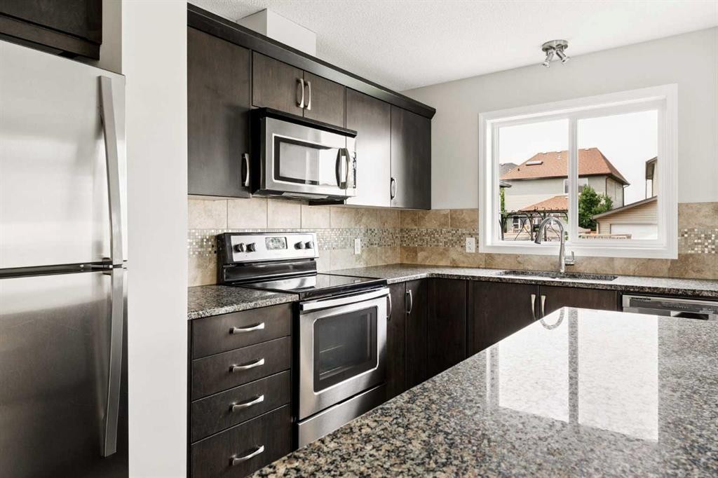 59 Elgin Meadows Park Se, Calgary, AB - Indoor Photo Showing Kitchen With Stainless Steel Kitchen With Upgraded Kitchen