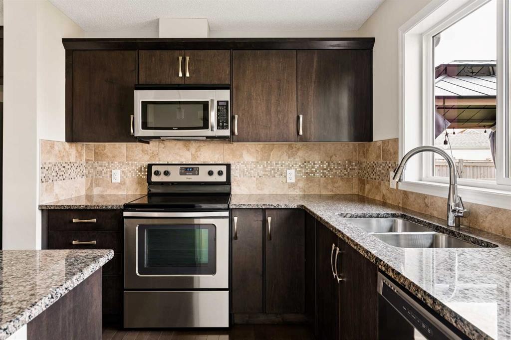 59 Elgin Meadows Park Se, Calgary, AB - Indoor Photo Showing Kitchen With Stainless Steel Kitchen With Double Sink With Upgraded Kitchen