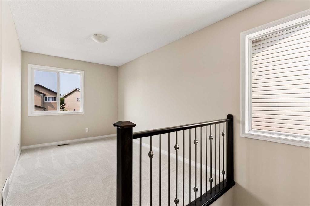 59 Elgin Meadows Park Se, Calgary, AB - Indoor Photo Showing Other Room