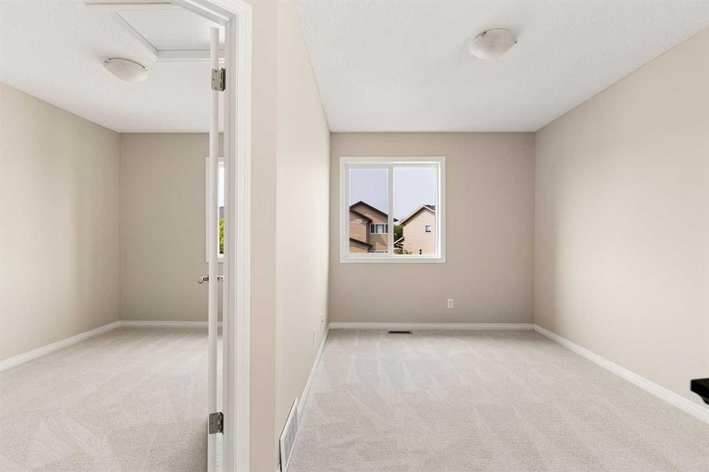 59 Elgin Meadows Park Se, Calgary, AB - Indoor Photo Showing Other Room