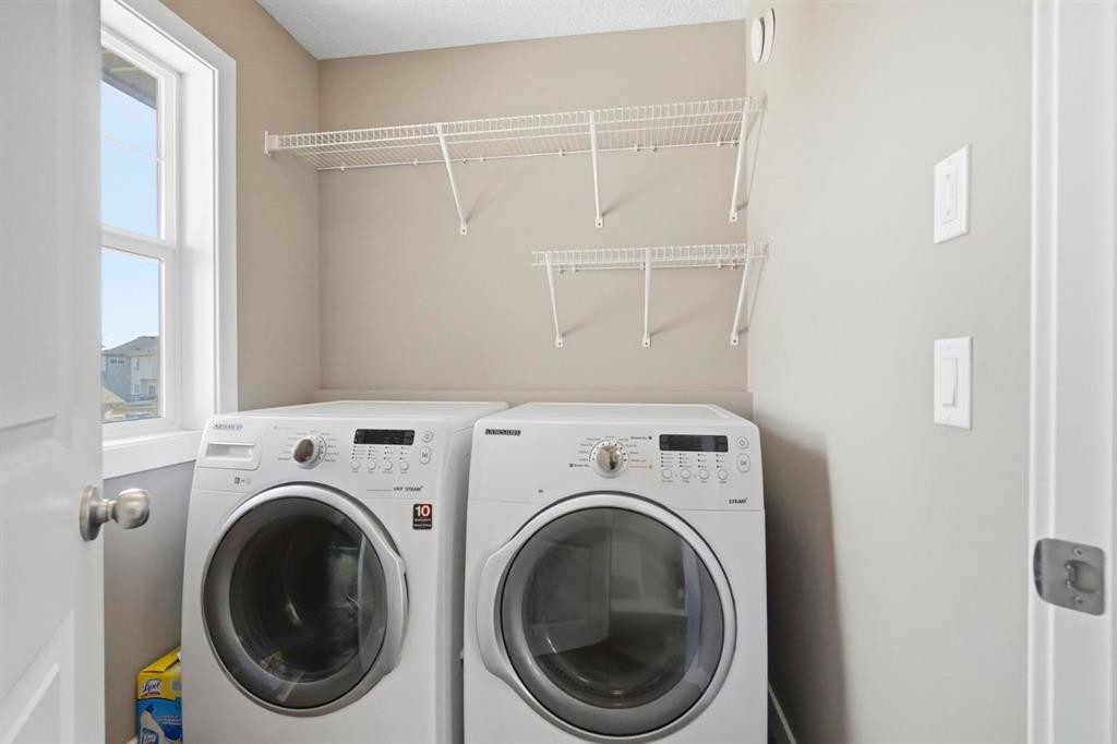 98 Panton Way Nw, Calgary, AB - Indoor Photo Showing Laundry Room
