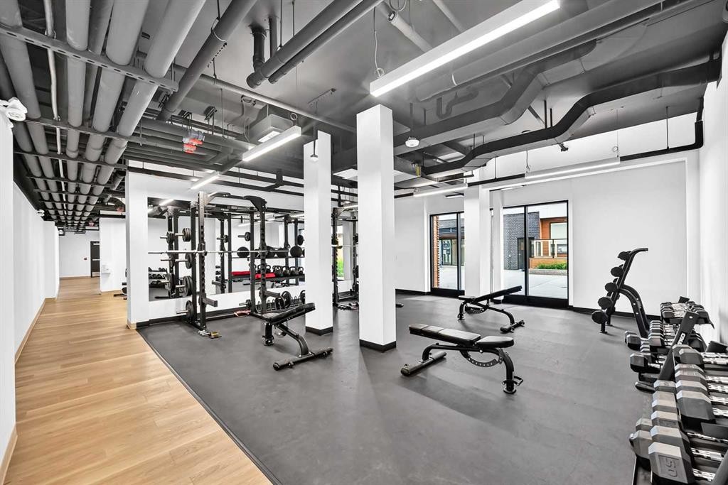 3101-8500 19 Avenue Se, Calgary, AB - Indoor Photo Showing Gym Room