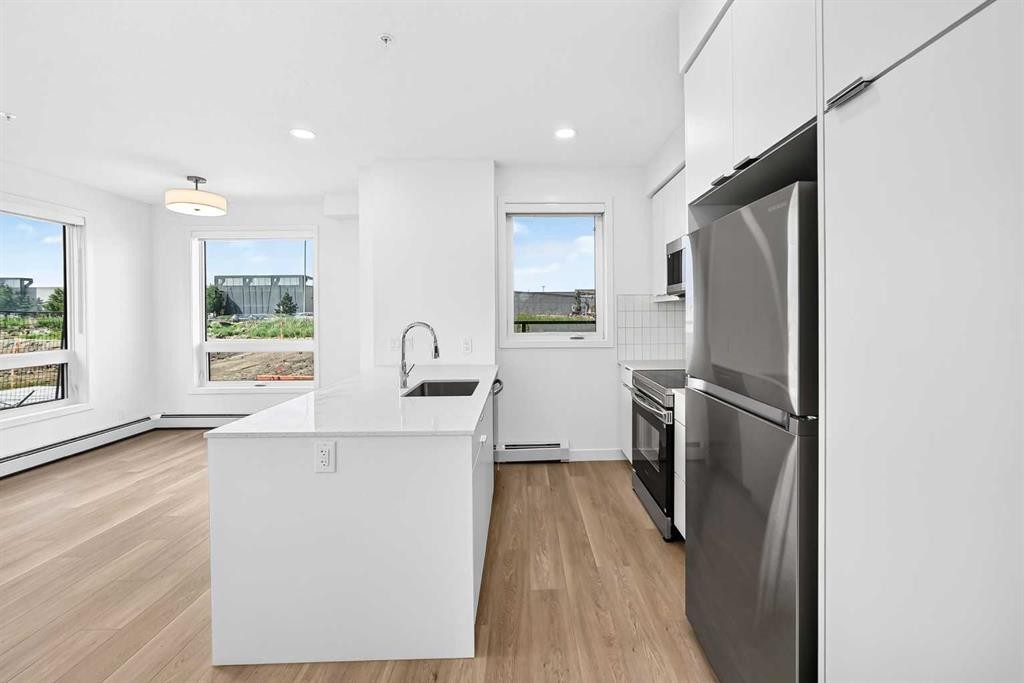 3101-8500 19 Avenue Se, Calgary, AB - Indoor Photo Showing Kitchen With Upgraded Kitchen