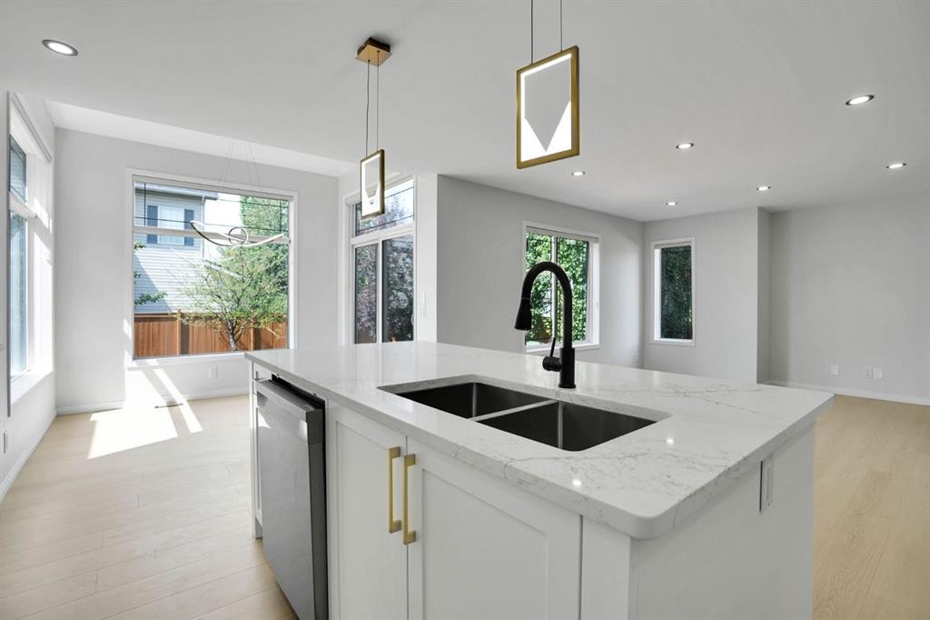 191 Cranwell Crescent Se, Calgary, AB - Indoor Photo Showing Kitchen With Double Sink With Upgraded Kitchen