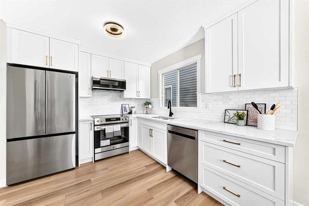 145 Sunvale Crescent Se, Calgary, AB - Indoor Photo Showing Kitchen With Stainless Steel Kitchen With Upgraded Kitchen