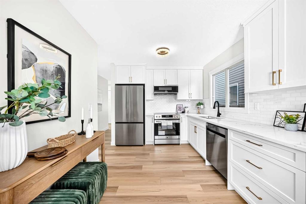 145 Sunvale Crescent Se, Calgary, AB - Indoor Photo Showing Kitchen With Stainless Steel Kitchen With Upgraded Kitchen