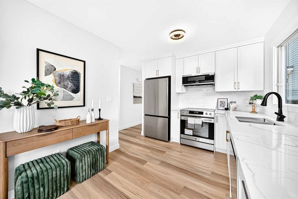 145 Sunvale Crescent Se, Calgary, AB - Indoor Photo Showing Kitchen With Stainless Steel Kitchen With Upgraded Kitchen