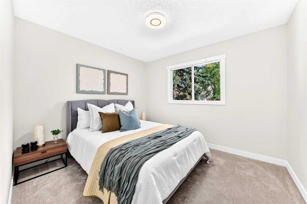 145 Sunvale Crescent Se, Calgary, AB - Indoor Photo Showing Bedroom