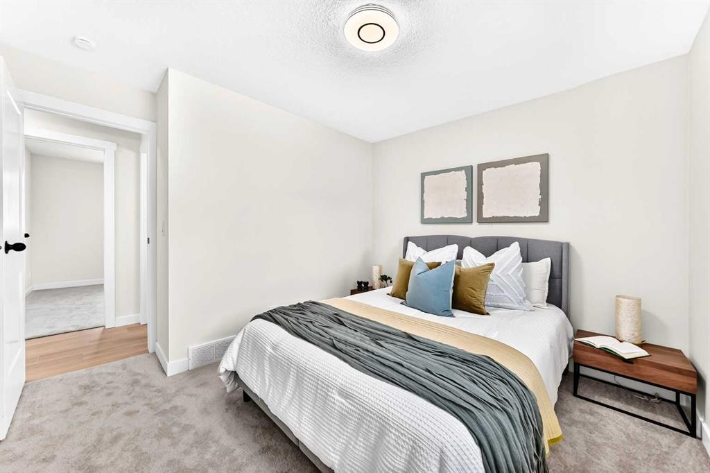 145 Sunvale Crescent Se, Calgary, AB - Indoor Photo Showing Bedroom