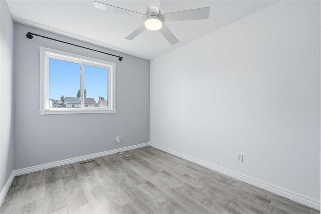 96 Rivercrest Crescent Se, Calgary, AB - Indoor Photo Showing Other Room