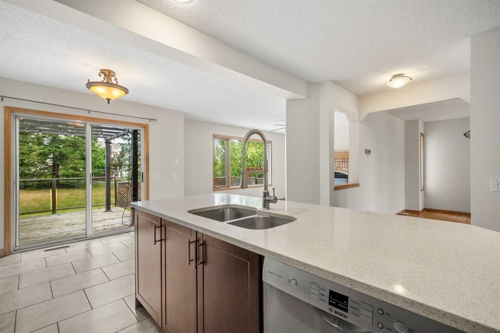 115 Macewan Park Circle, Calgary, AB - Indoor Photo Showing Kitchen With Double Sink