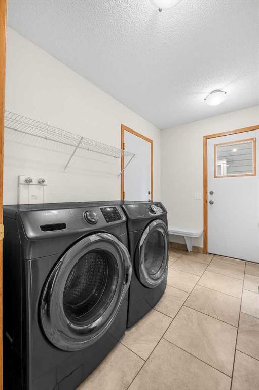 115 Macewan Park Circle, Calgary, AB - Indoor Photo Showing Laundry Room