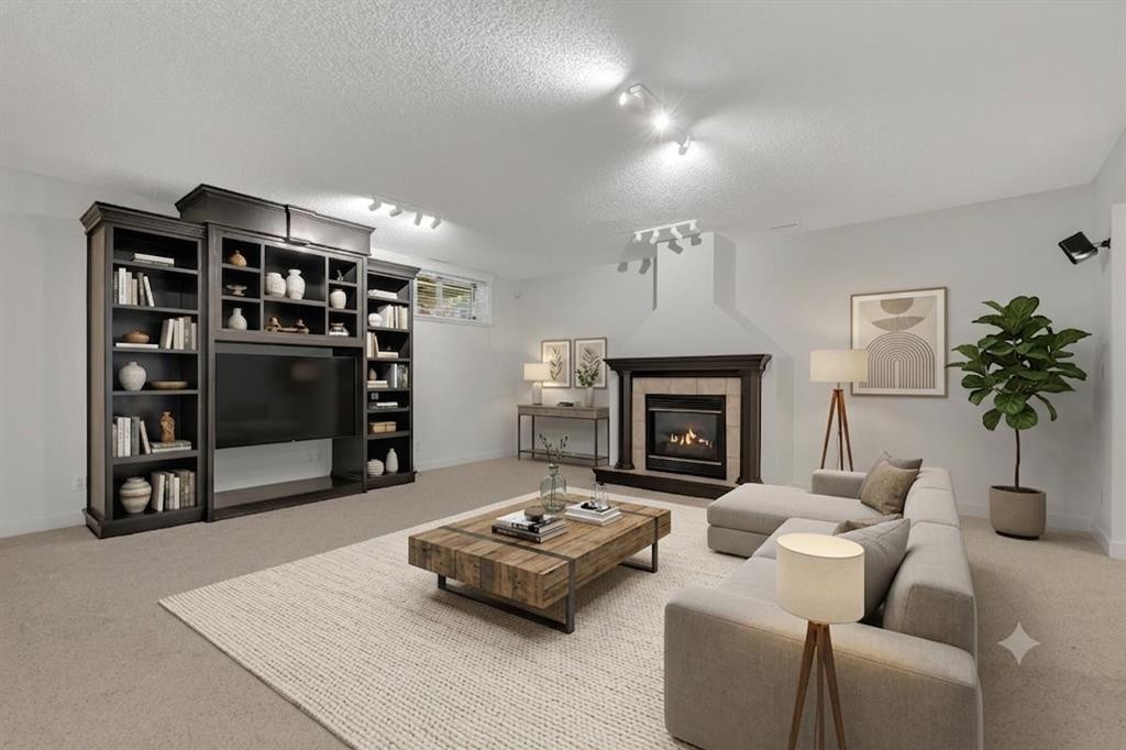 694 Panorama Hills Drive Nw, Calgary, AB - Indoor Photo Showing Living Room With Fireplace