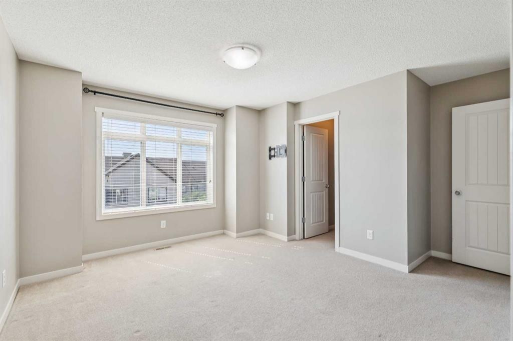 409 Copperpond Landing Se, Calgary, AB - Indoor Photo Showing Other Room