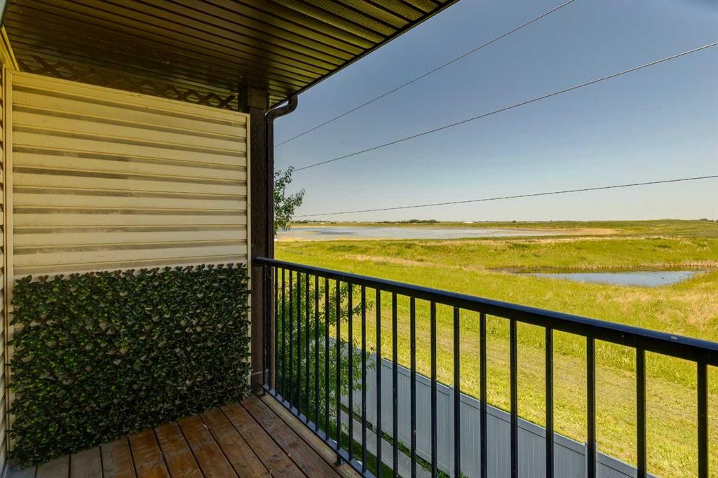 409 Copperpond Landing Se, Calgary, AB - Outdoor With Deck Patio Veranda With Exterior