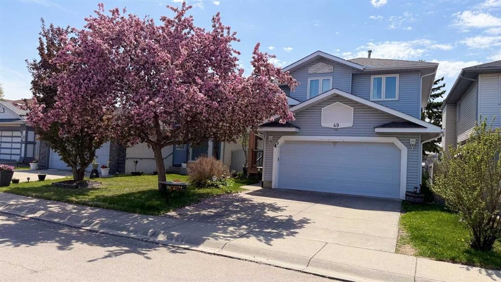 49 Applewood Court Se, Calgary, AB - Outdoor With Facade