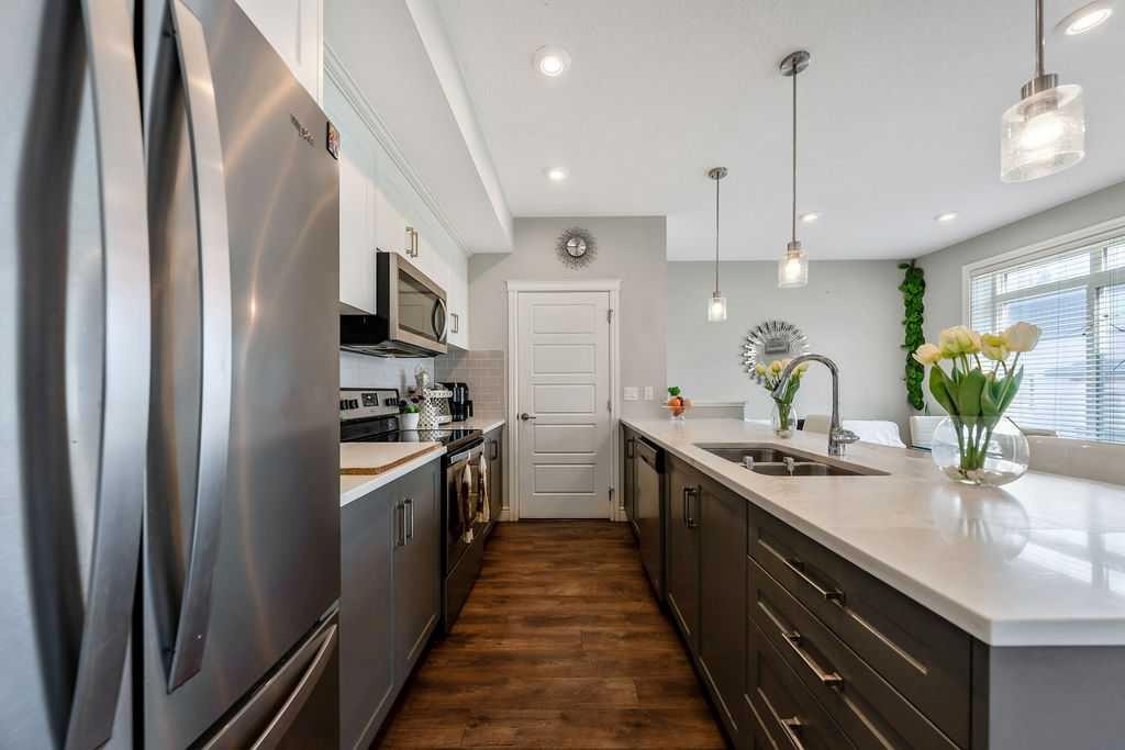 116 Savanna Walk Ne, Calgary, AB - Indoor Photo Showing Kitchen With Double Sink With Upgraded Kitchen