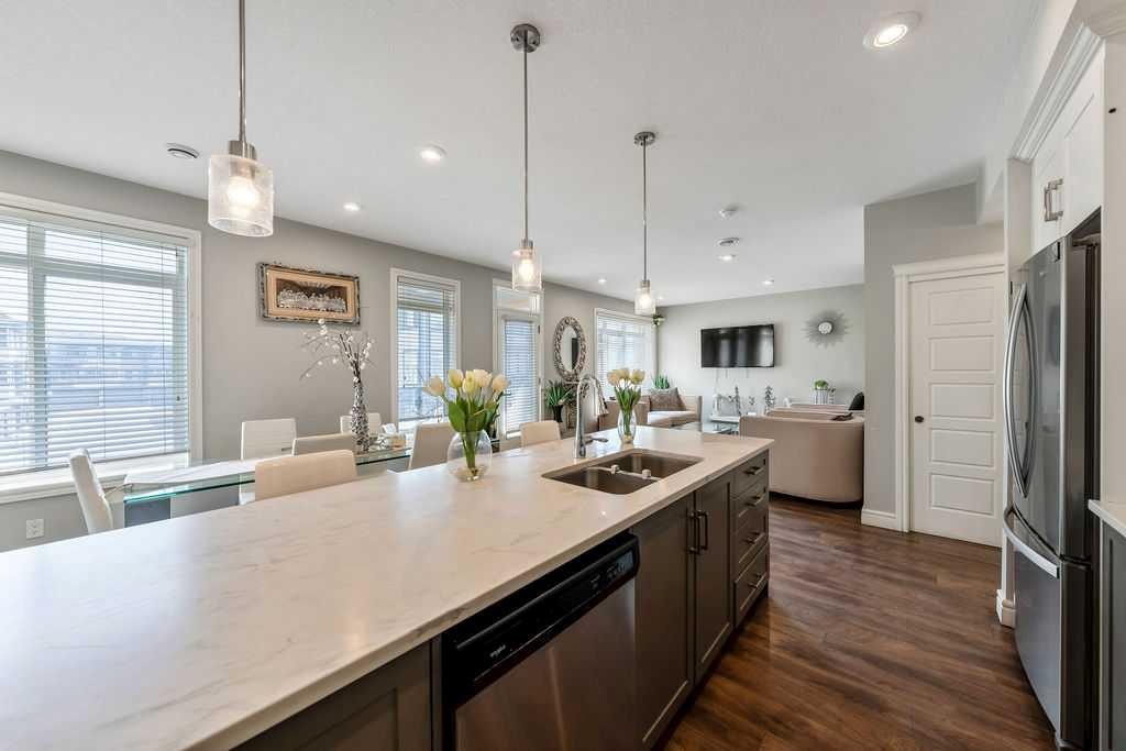 116 Savanna Walk Ne, Calgary, AB - Indoor Photo Showing Kitchen With Double Sink With Upgraded Kitchen