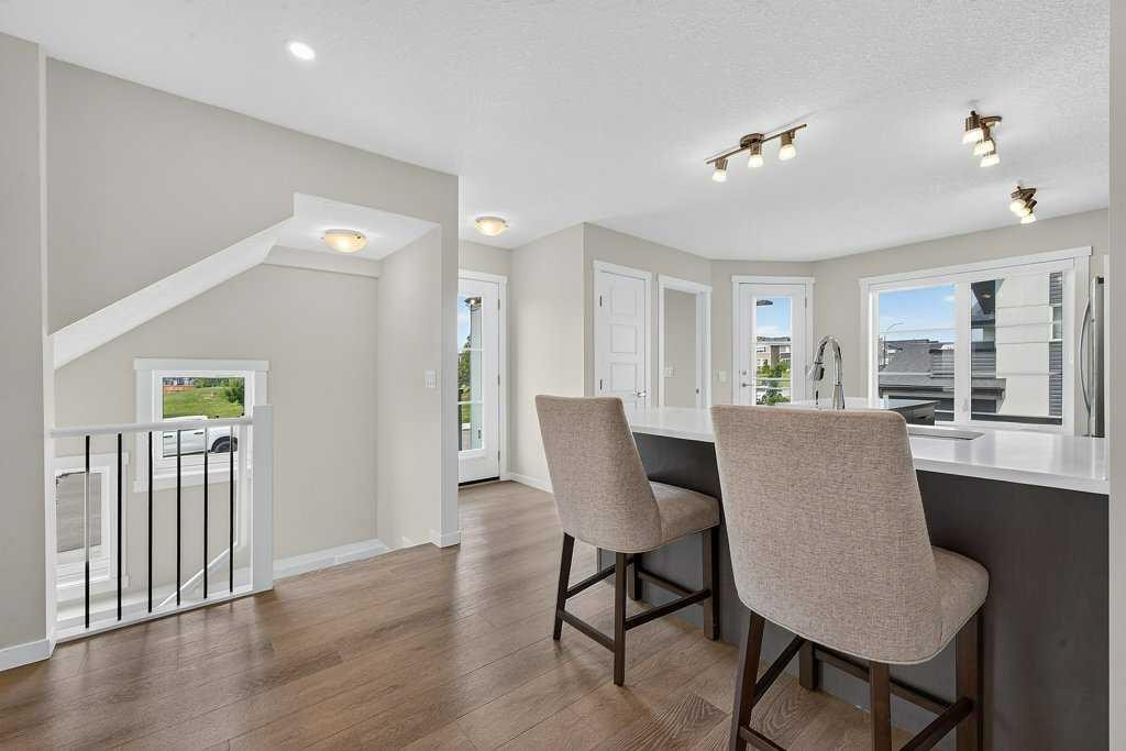709-474 Seton Circle Se, Calgary, AB - Indoor Photo Showing Dining Room