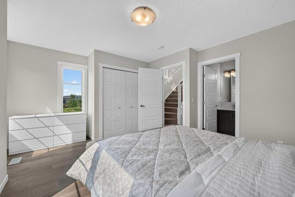 709-474 Seton Circle Se, Calgary, AB - Indoor Photo Showing Bedroom