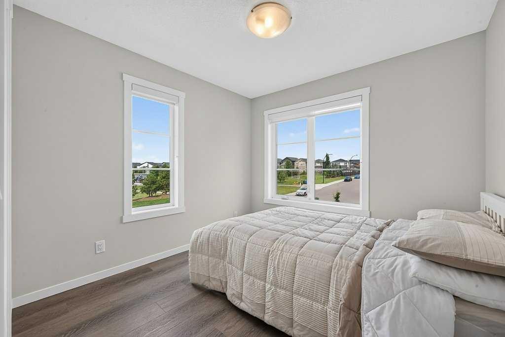 709-474 Seton Circle Se, Calgary, AB - Indoor Photo Showing Bedroom
