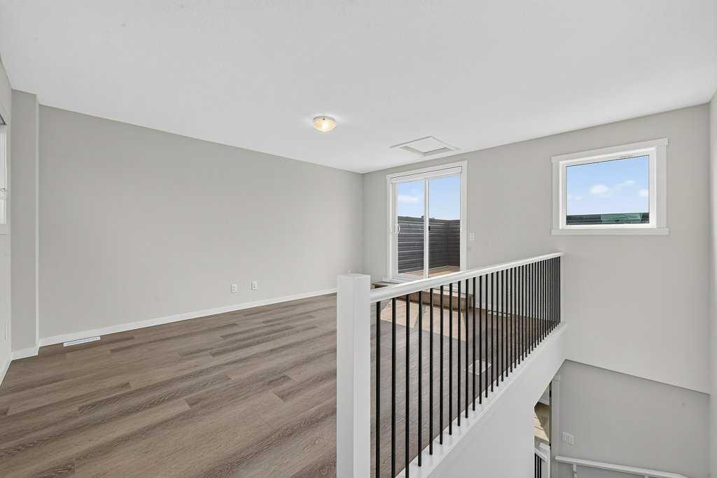 709-474 Seton Circle Se, Calgary, AB - Indoor Photo Showing Other Room