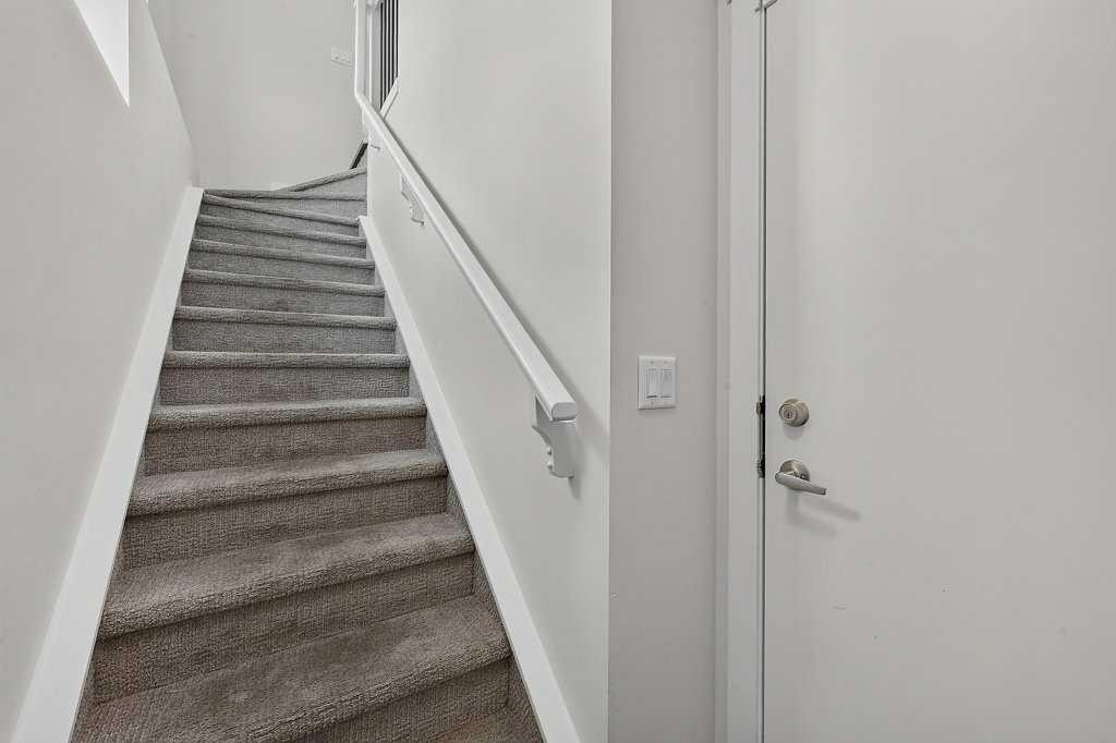 709-474 Seton Circle Se, Calgary, AB - Indoor Photo Showing Other Room