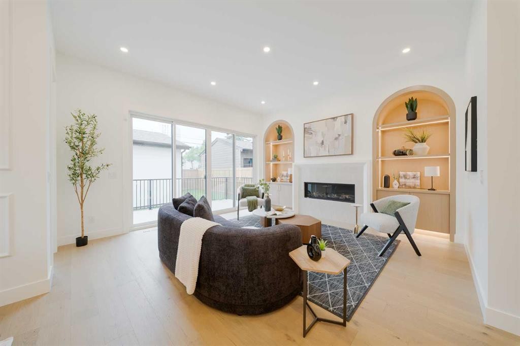 2207 Victoria Crescent Nw, Calgary, AB - Indoor Photo Showing Living Room With Fireplace