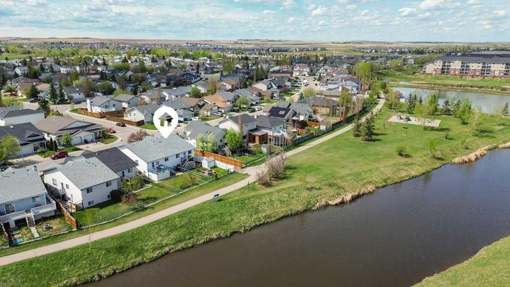 202 Willowbrook Close Nw, Airdrie, AB - Outdoor With Body Of Water With View