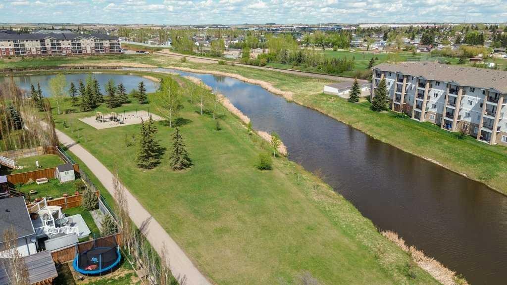 202 Willowbrook Close Nw, Airdrie, AB - Outdoor With Body Of Water With View