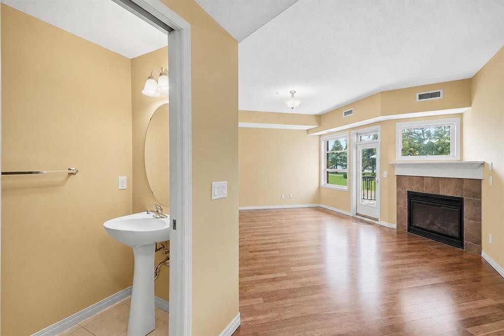 2144-48 Inverness Gate Se, Calgary, AB - Indoor With Fireplace