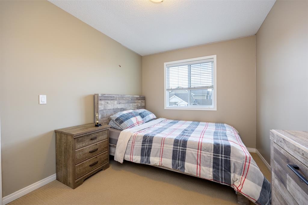 462 Williamstown Green Nw, Airdrie, AB - Indoor Photo Showing Bedroom