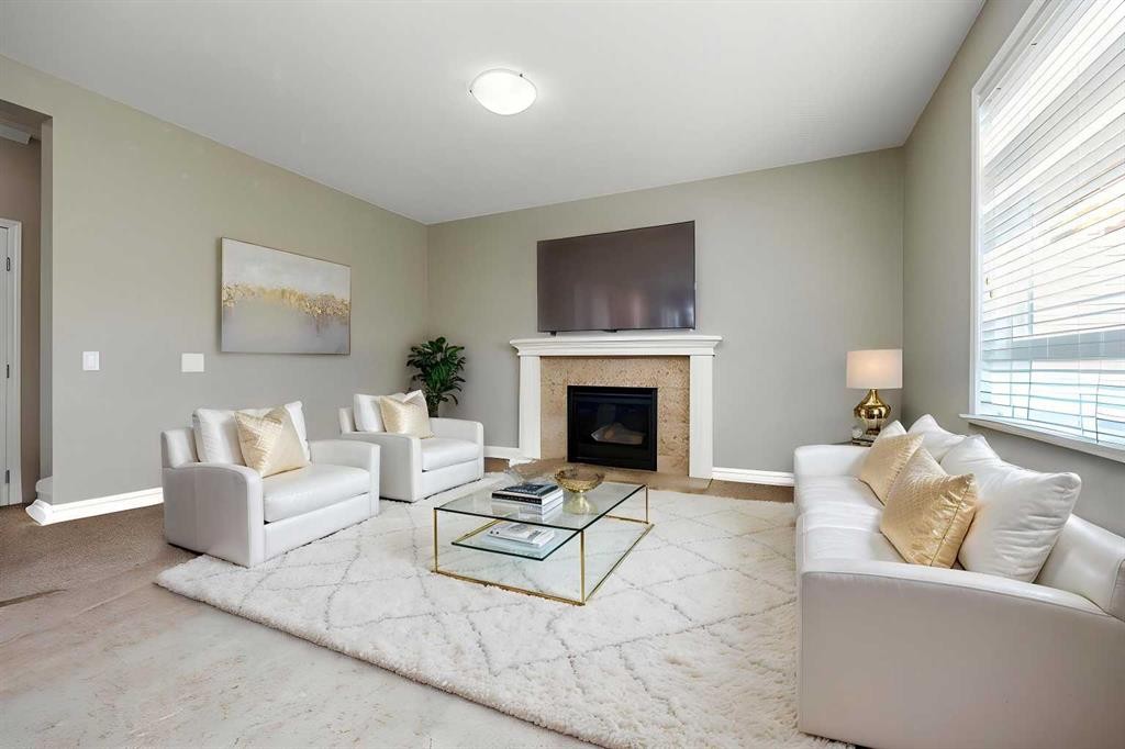 462 Williamstown Green Nw, Airdrie, AB - Indoor Photo Showing Living Room With Fireplace